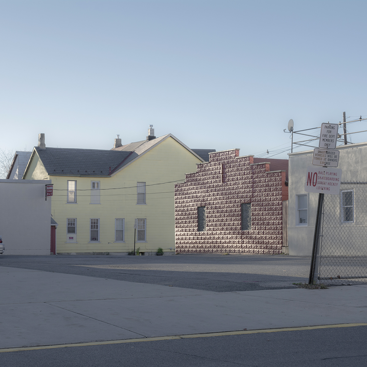 A Red Building and a Yellow House