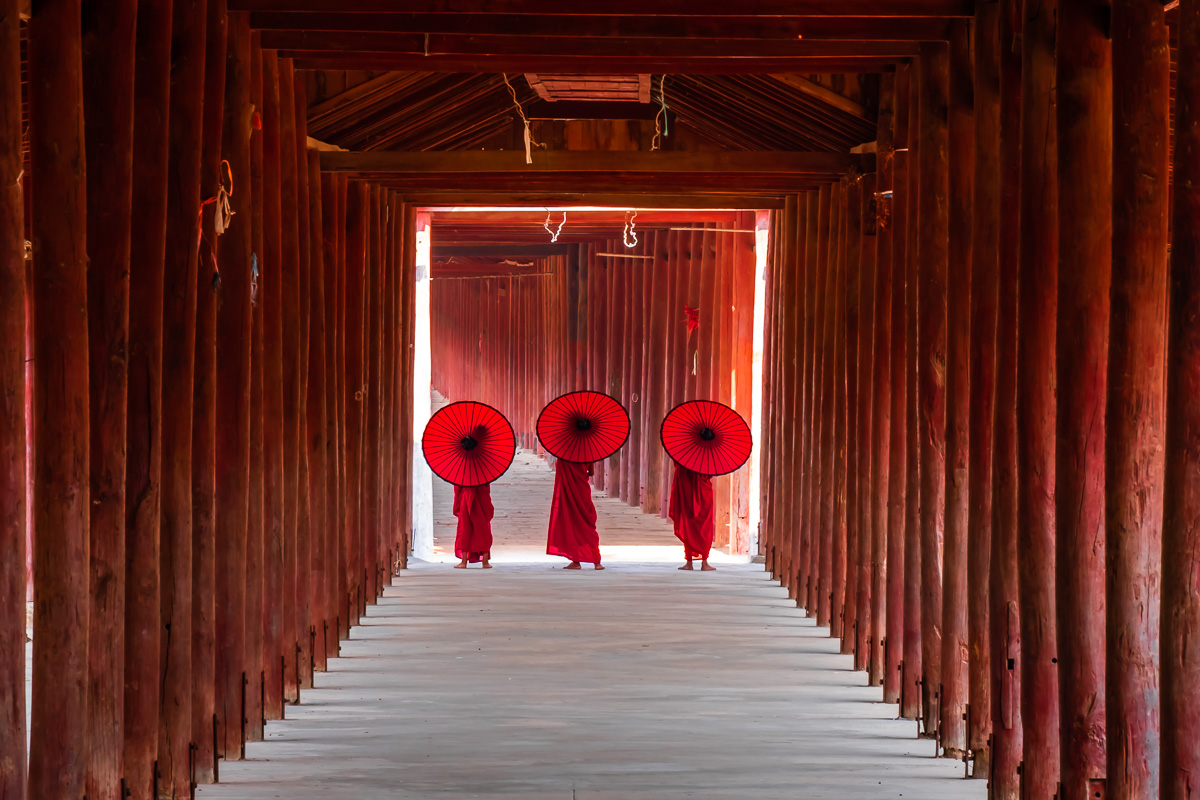 Novices monk walking in ancient temple