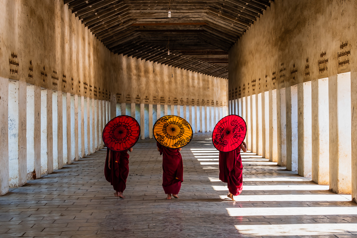 Three novices walking to a temple in Bagan