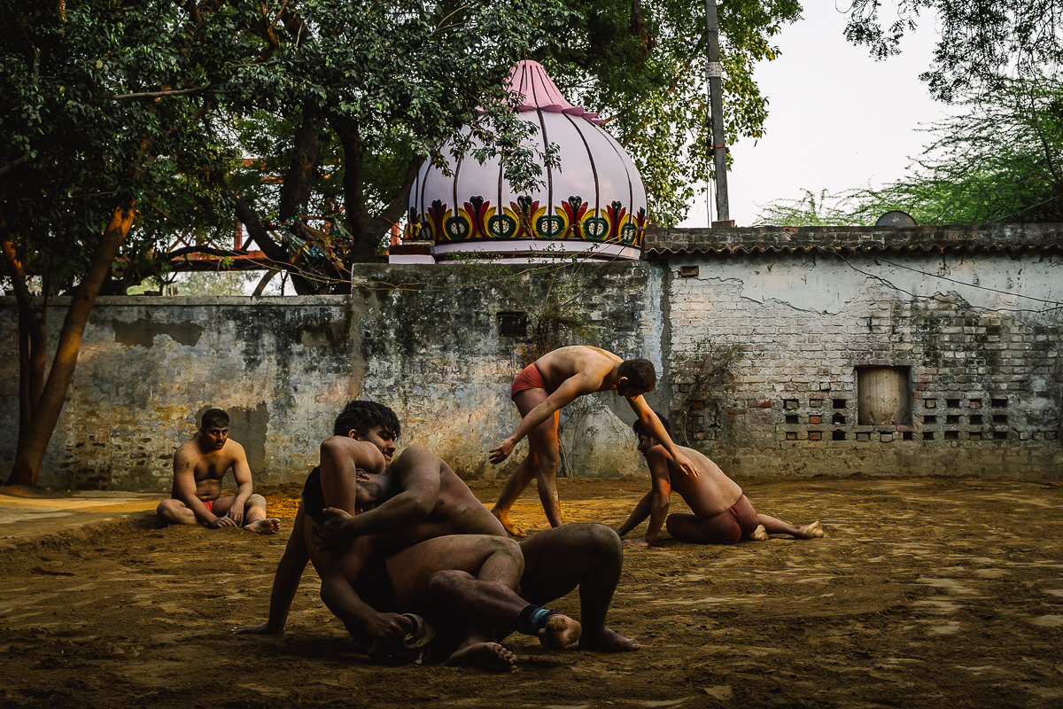 Kushti wrestlers at sunset
