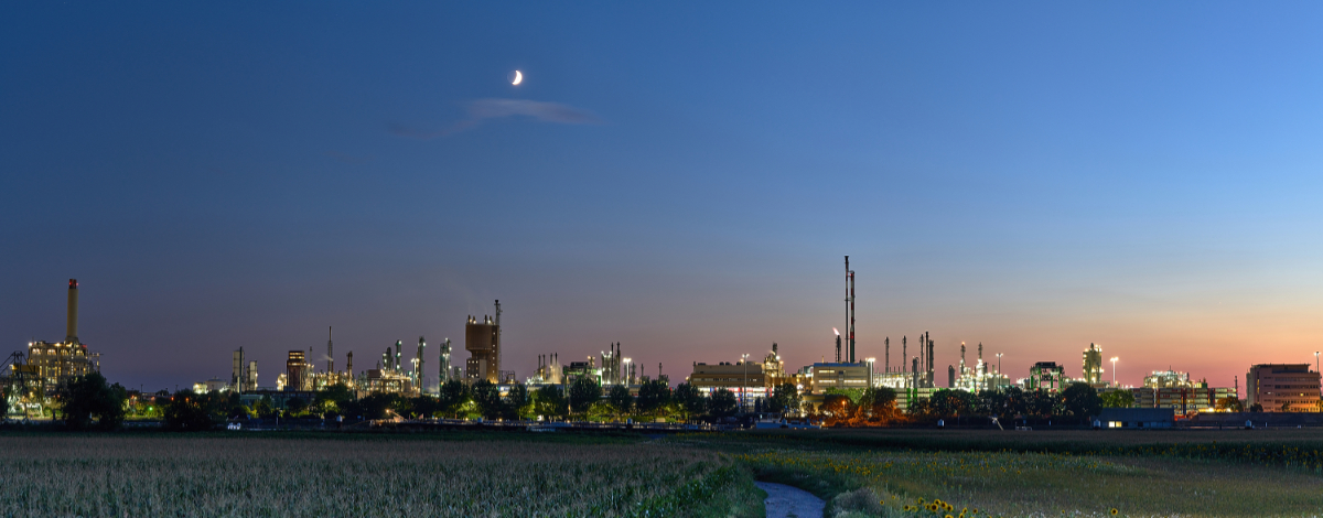 Chemical Plant Rising from the Fields