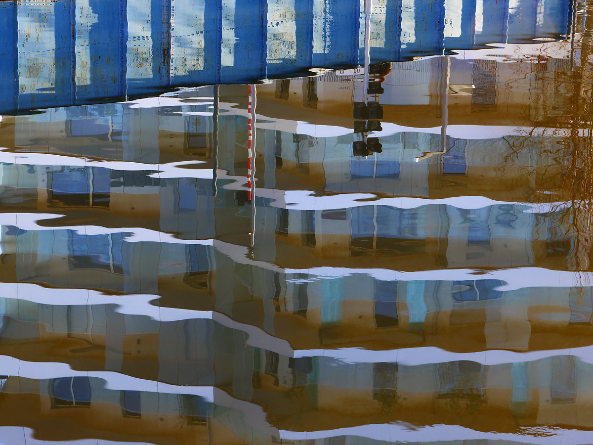 REFLECTIONS AROUND A BRIDGE