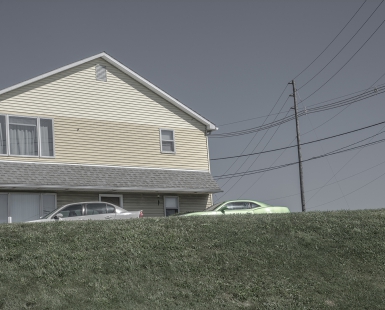 A Yellow House and a Lime Green Car
