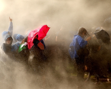 Water Cannon use against protesters in Hamburg Germany.