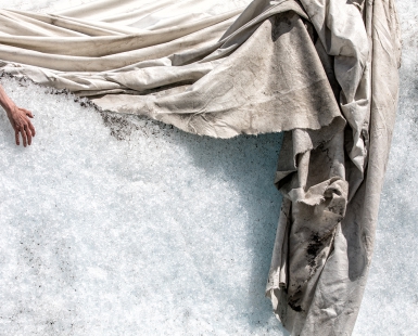 Climate Change - Hand Desperately  Grasping  Melting Ice