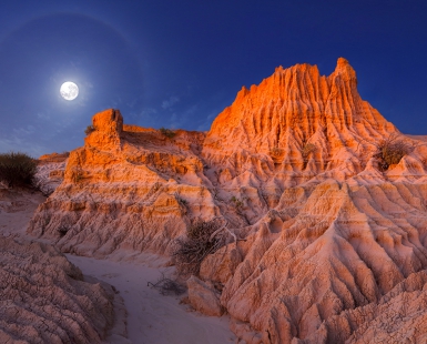 Glory Moon over Lunar Landscape