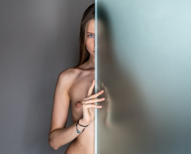 Behind the glass