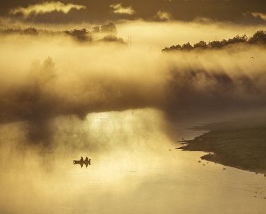 Dawn in the embrace of fog